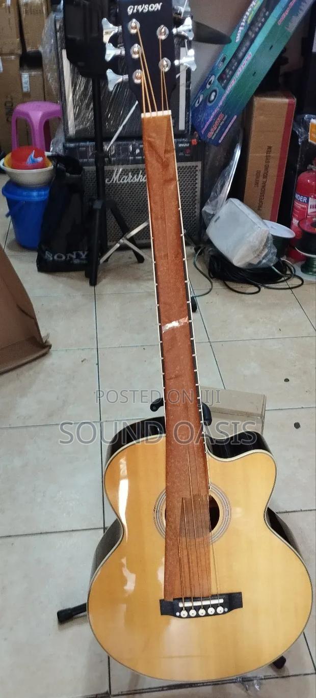 Givson Semi-Acoustic Bass Guitar With Bag · Photo 1