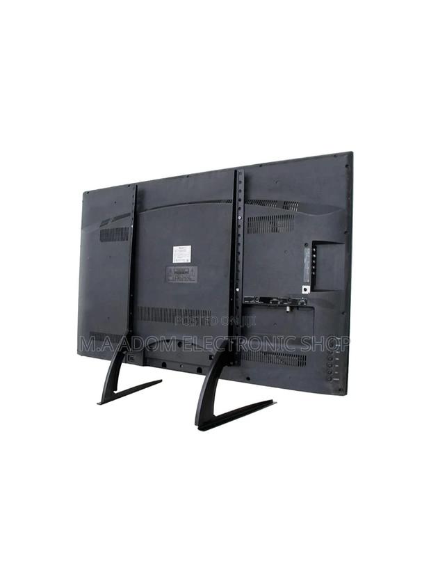 Durable Tv Leg Stand 32”-75” · Photo 1