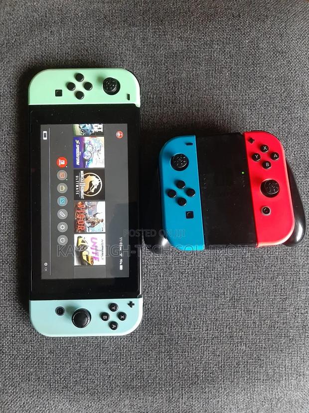 Nintendo Switch With Mk 1 Other Games and Accessories · Photo 2