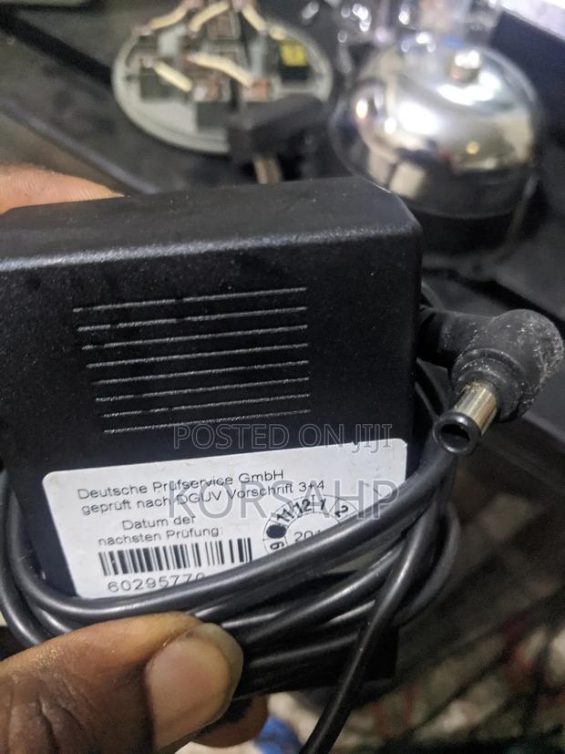 Seiko Epson AC Adapter Output 13.5v · Photo 1