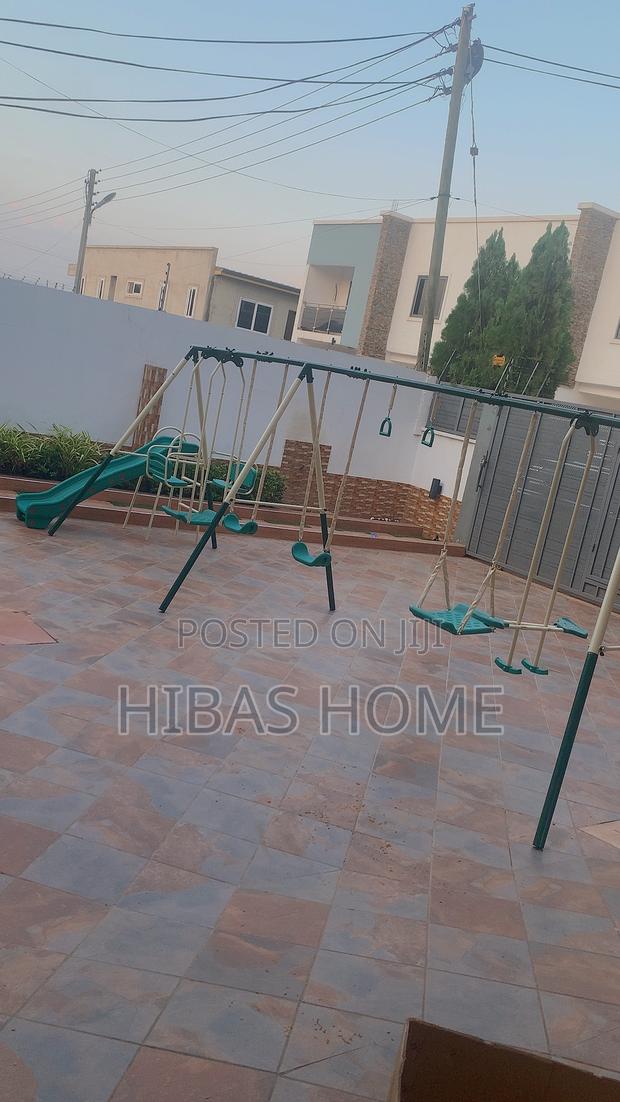 9 Station Swing Set Metal Swing Set and Slide · Photo 2