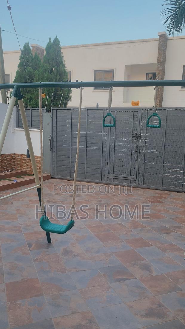 9 Station Swing Set Metal Swing Set and Slide · Photo 3