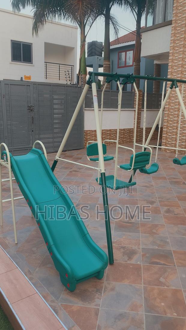 9 Station Swing Set Metal Swing Set and Slide · Photo 4