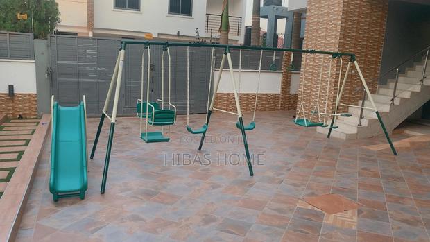 9 Station Swing Set Metal Swing Set and Slide · Photo 5