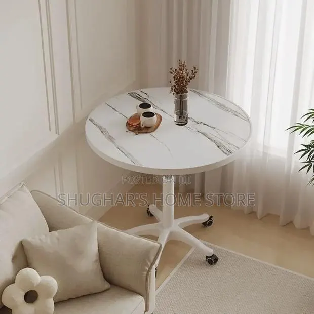Round Adjustable Marble Table · Photo 1