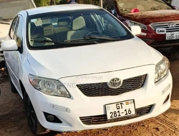 Toyota Corolla 2010 White · Photo 1