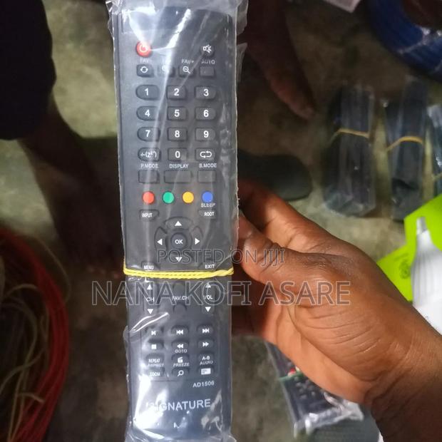 Signature Tv Remote Control · Photo 1