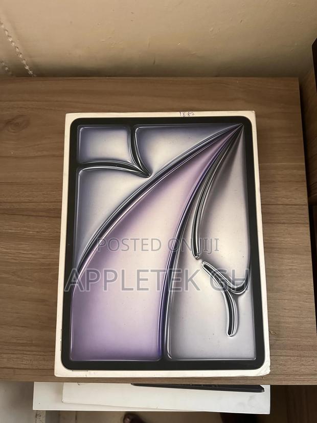 New Apple iPad Air 128 GB Silver · Photo 1