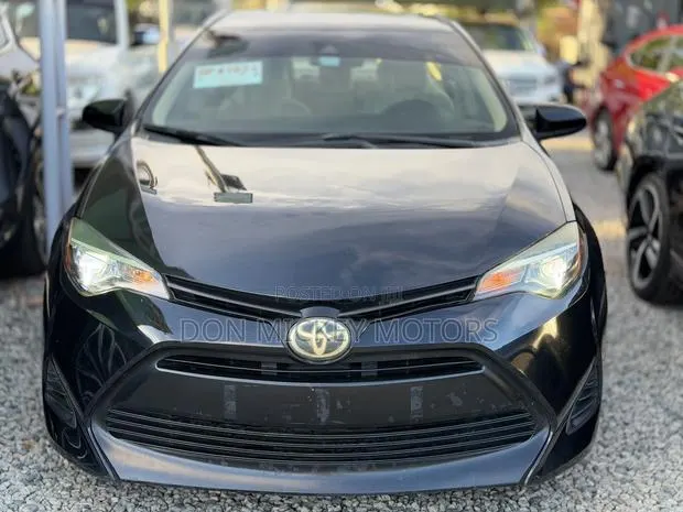 Toyota Corolla LE (1.8L 4cyl 2A) 2019 Black · Photo 1