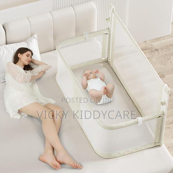 Baby Co Sleeper Cot in Bed · Photo 1