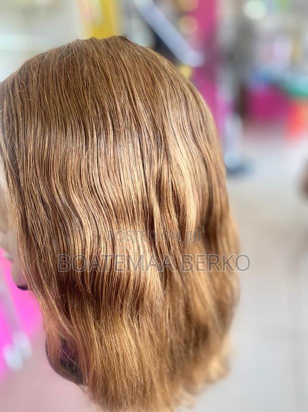 Blonde Wavy Human Hair Wig · Photo 6