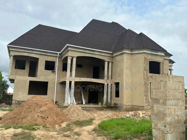 Installation of Woodwork Trusses and Euro Tiles Roofing · Photo 2