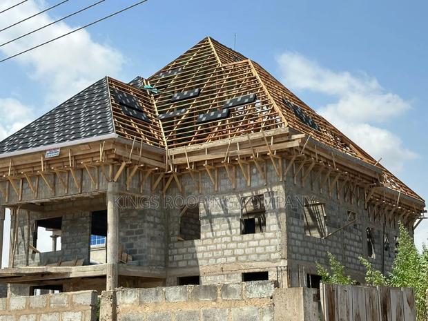 Installation of Woodwork Trusses and Euro Tiles Roofing · Photo 3
