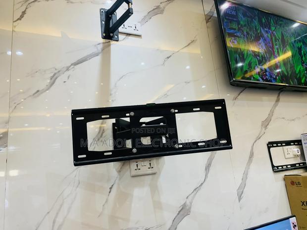 Luniquz Full Motion TV Wall Mount For Most 32-75 Inch · Photo 1