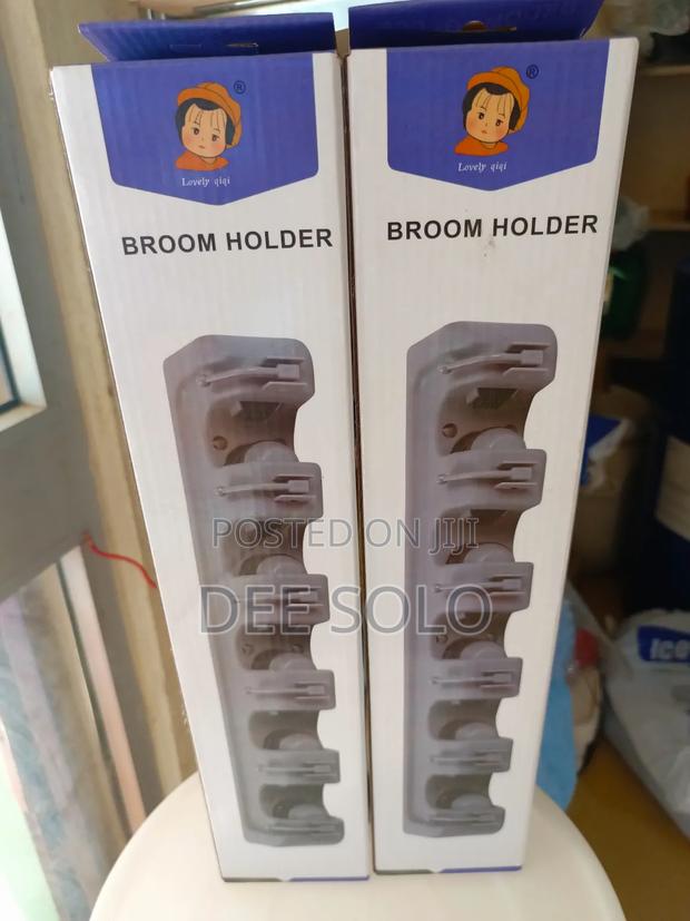 Wall Bracket Brush and Mop Holder · Photo 1