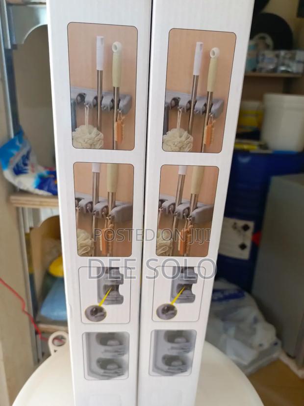 Wall Bracket Brush and Mop Holder · Photo 2