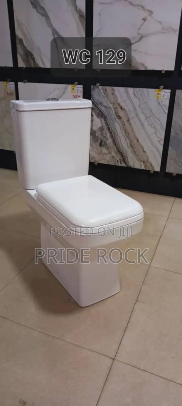 Small Tank, Square Shape, Press Top Wc · Photo 1