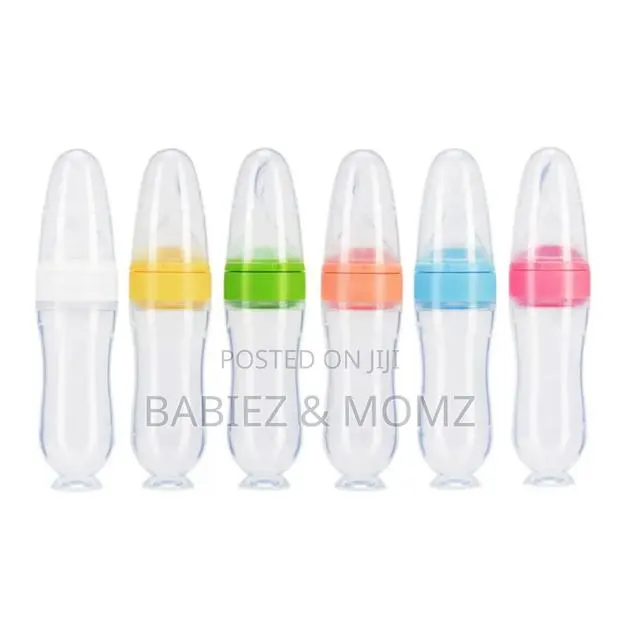 Squeeze Silicone Baby Feeding Bottle With Spoon Suction Base · Photo 1