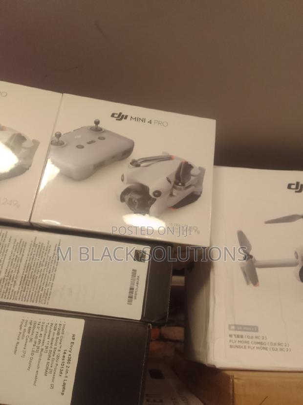 Dji Mini 4 Pro Camera Drone (With Rc-N2 Remote · Photo 2