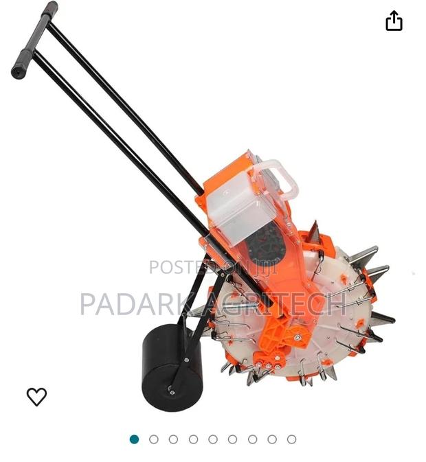 All Seed Planter and Fertilizer Applicator · Photo 1