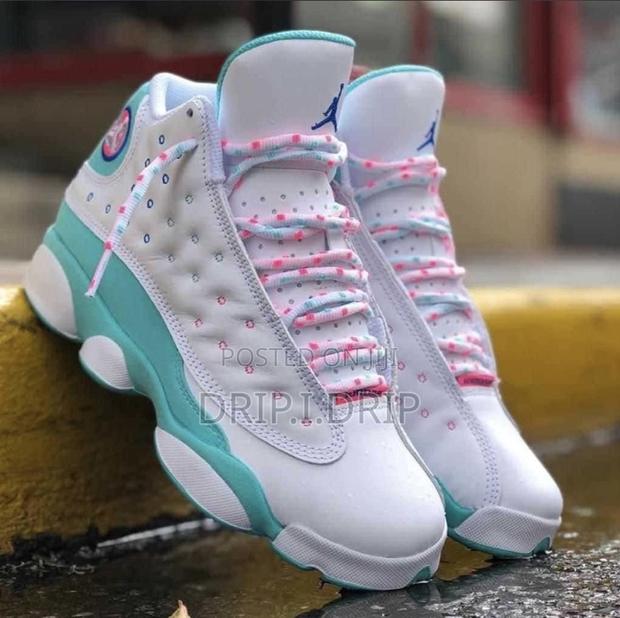 Jordan 13 Rethro . Comes in Box . Comes in All Sizes