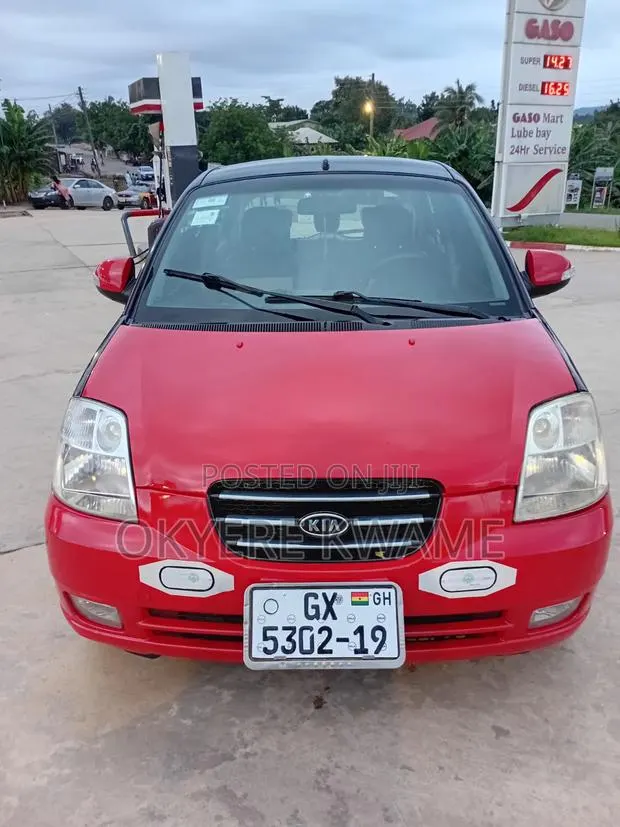 Kia Picanto 2010 Red · Photo 1
