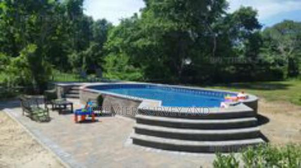 Affordable Pool Construction · Photo 8