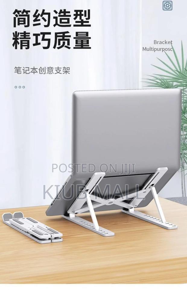 Adjustable Laptop Cooling Pad · Photo 1