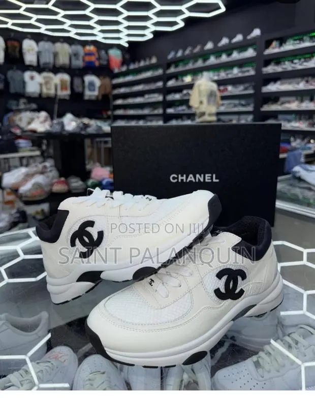 White and Black Chanel CC LSneakers · Photo 1