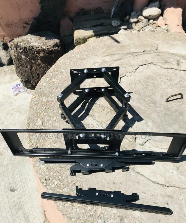 Order Quality Adjustable Tv Bracket for 32” to 80 Inch. · Photo 1