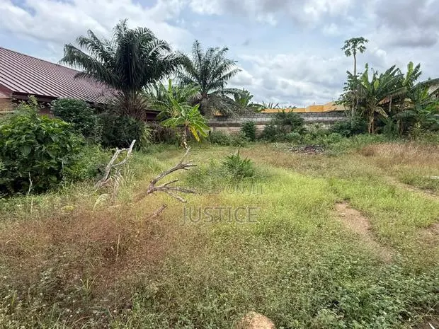 100 by 143 Size Plot With Old Building Achimota · Photo 1