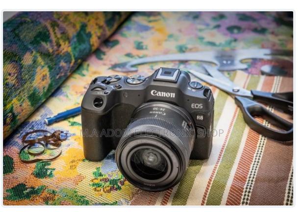 EOS E8 Canon · Photo 1