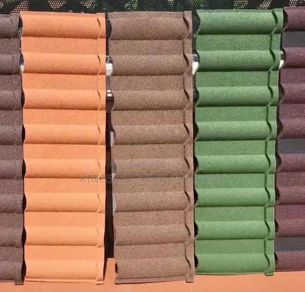 Shingles, Roman, and Bond Alu-Zinc Roof · Photo 4