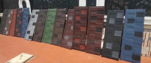 Shingles, Roman, and Bond Alu-Zinc Roof · Photo 2