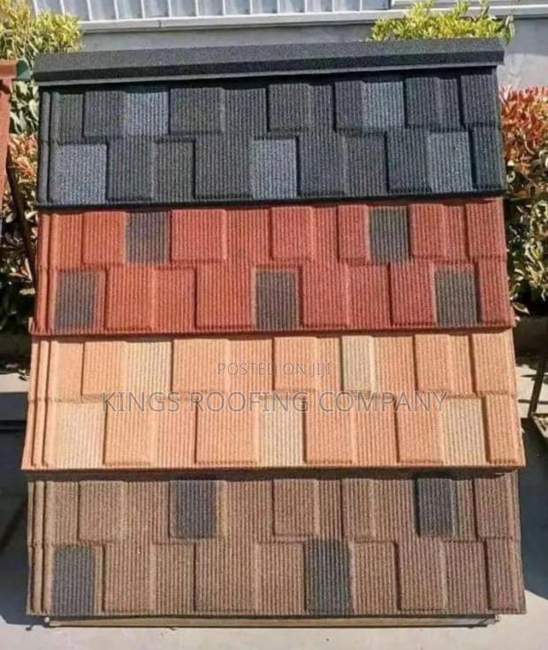Shingles, Roman, and Bond Alu-Zinc Roof · Photo 1