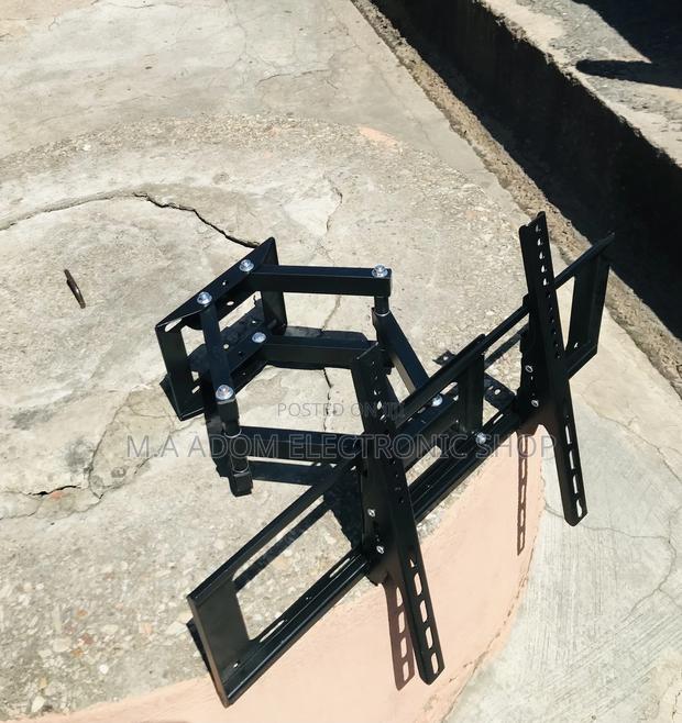 Order Adjustable Wall Mount for Tv 32 Inch to 80”(Black). · Photo 1
