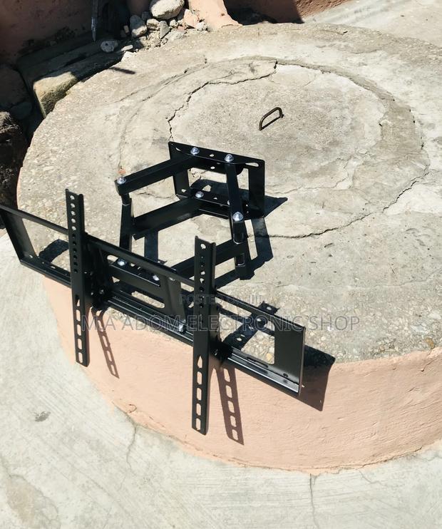 Order Quality Adjustable Wall Mount for Tv Between 32-80” · Photo 1