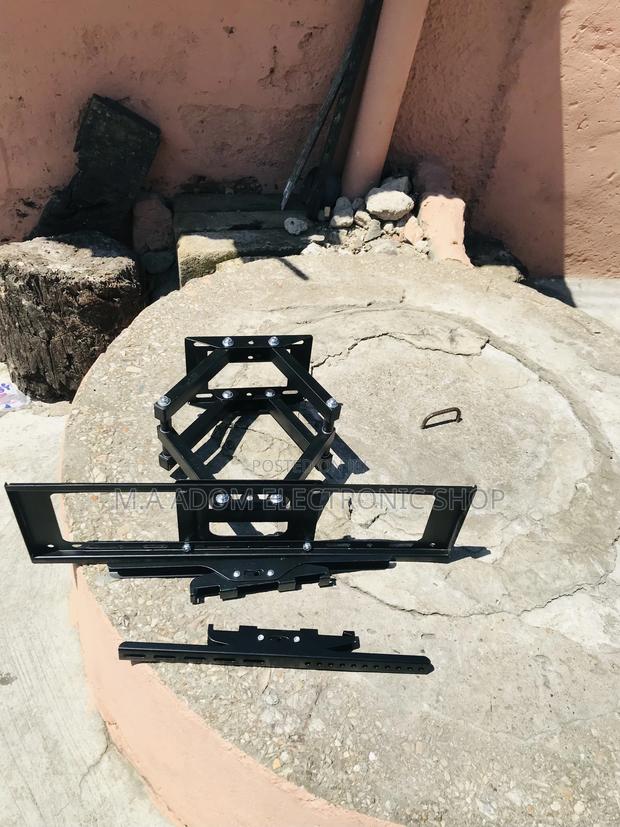 Order Durable Adjustable Tv Mount for Tv Between 32-80” · Photo 1