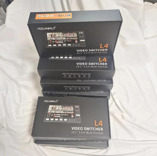 Feel World L4 Video Switcher Canon Battery · Photo 1