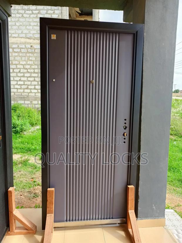 New Elegant Gray Metal Security Door · Photo 1