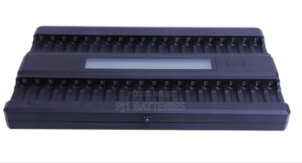 Aa, AAA, 9v Charger With 40 Slot · Photo 1