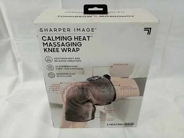 Calming Heat Massaging Knee Wrap · Photo 1
