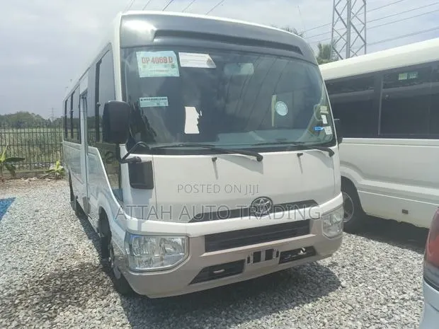 Toyota Coaster 2017 White · Photo 1