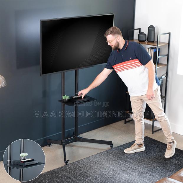 Black Durable Mobile Tv Cart for Tv Between 32”-70” · Photo 1