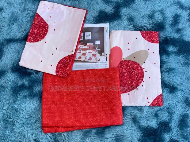 Red and White Bedsheet · Photo 1