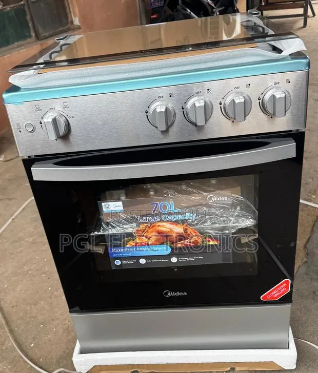 Midea 4 Burner 60x60cm Gas Cooker | 70l Oven and Grill Auto Ignition · Photo 1