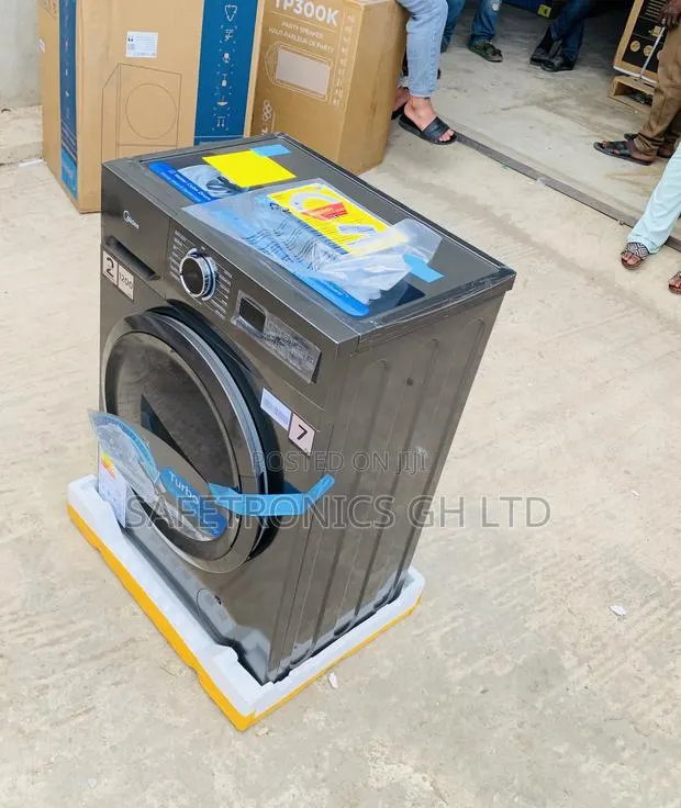 Brand New Midea 7 Kg Front Load Washing Machine Mf110w70/T) · Photo 1