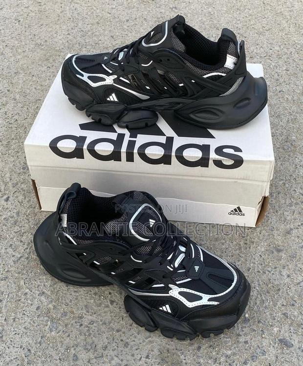 Adidas XLG Runner Deluxe · Photo 1