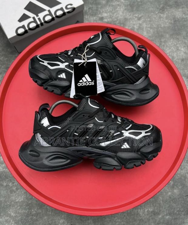 Adidas XLG Runner Deluxe · Photo 2