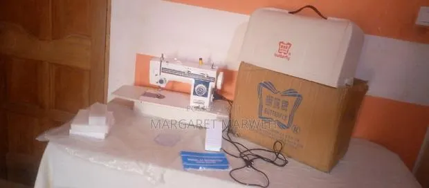 Butterfly Electric Sewing Machine · Photo 1